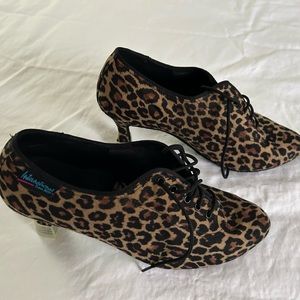 Leopard print ballroom dance shoes with suede soles and heel protectors